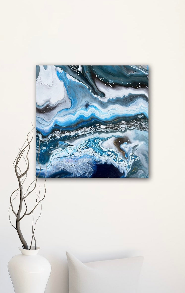 black, white, and blue fluid acrylics creating an icy abstract landscape