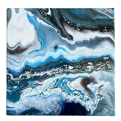 black, white, and blue fluid acrylics creating an icy abstract landscape