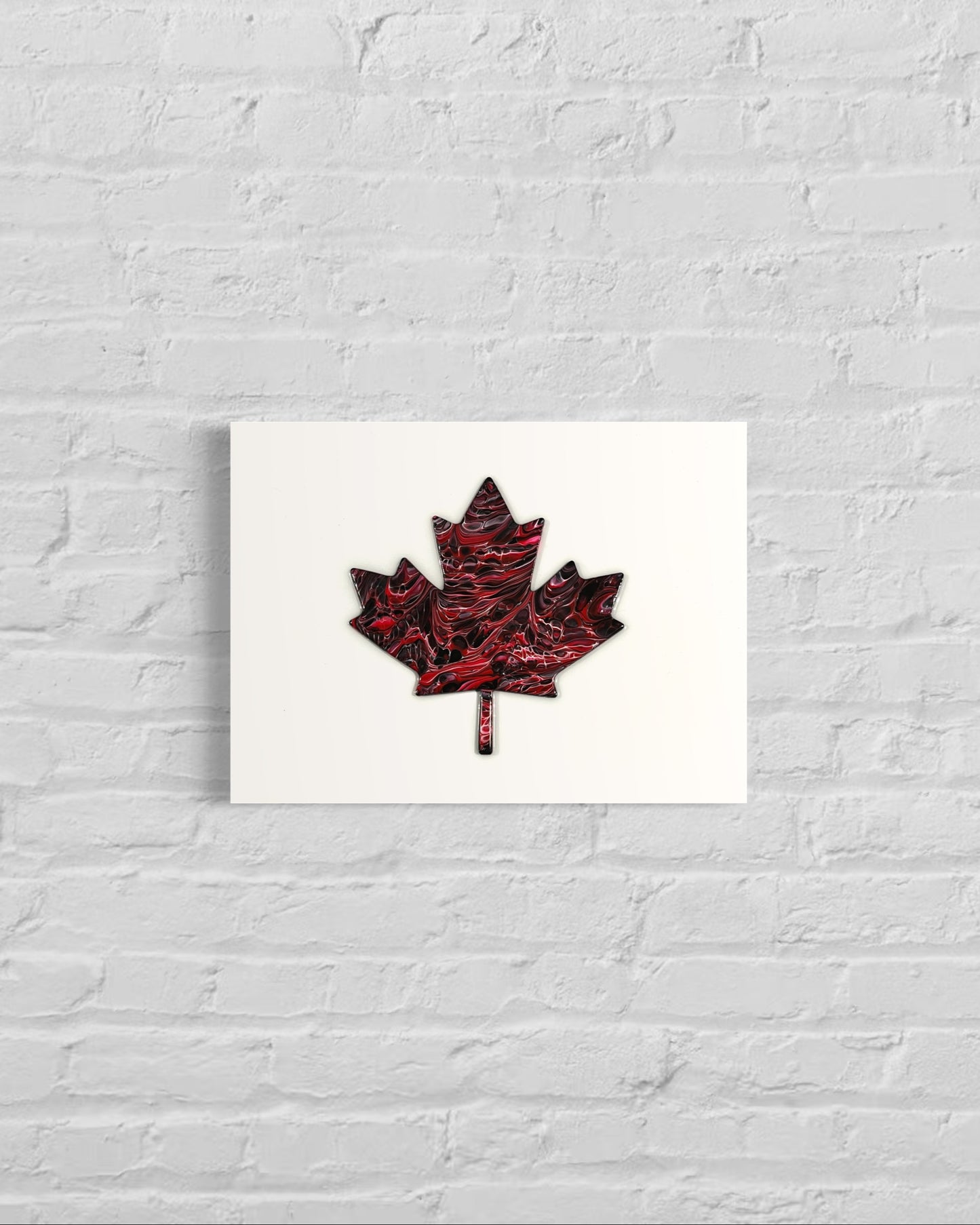 Black and white abstract cell art maple leaf on a white background. This image is of a stretched canvas print.