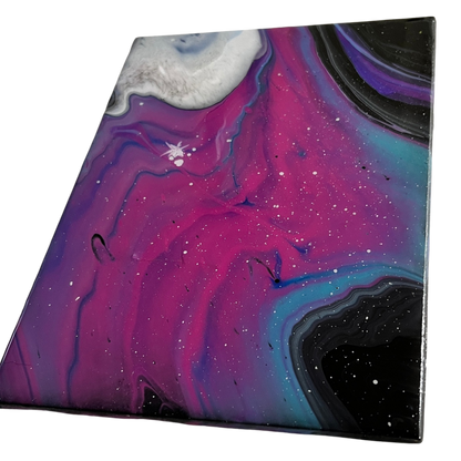 ceramic tile with an epoxy coating over a galaxy acrylic painting