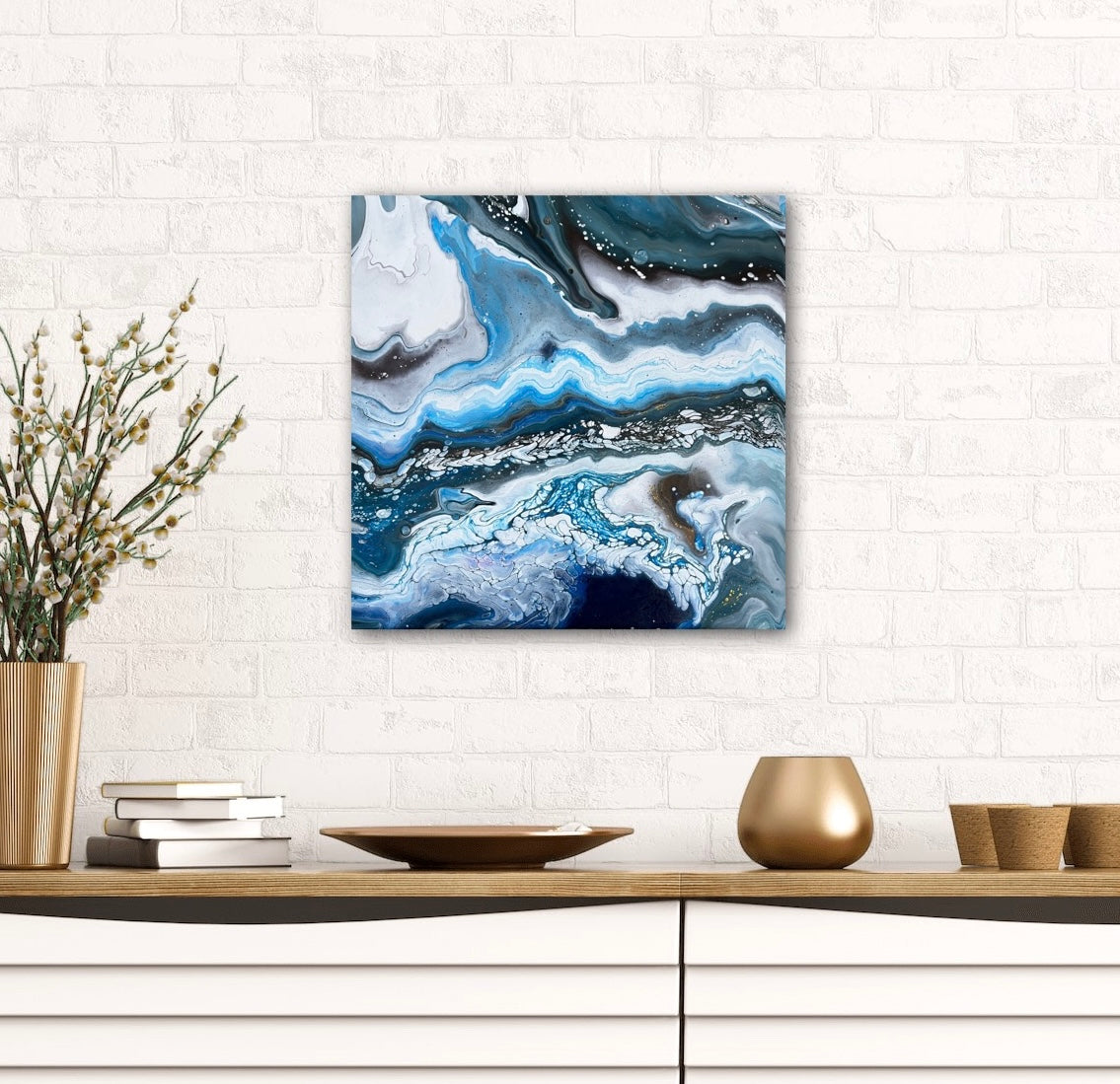 black, white, and blue fluid acrylics creating an icy abstract landscape