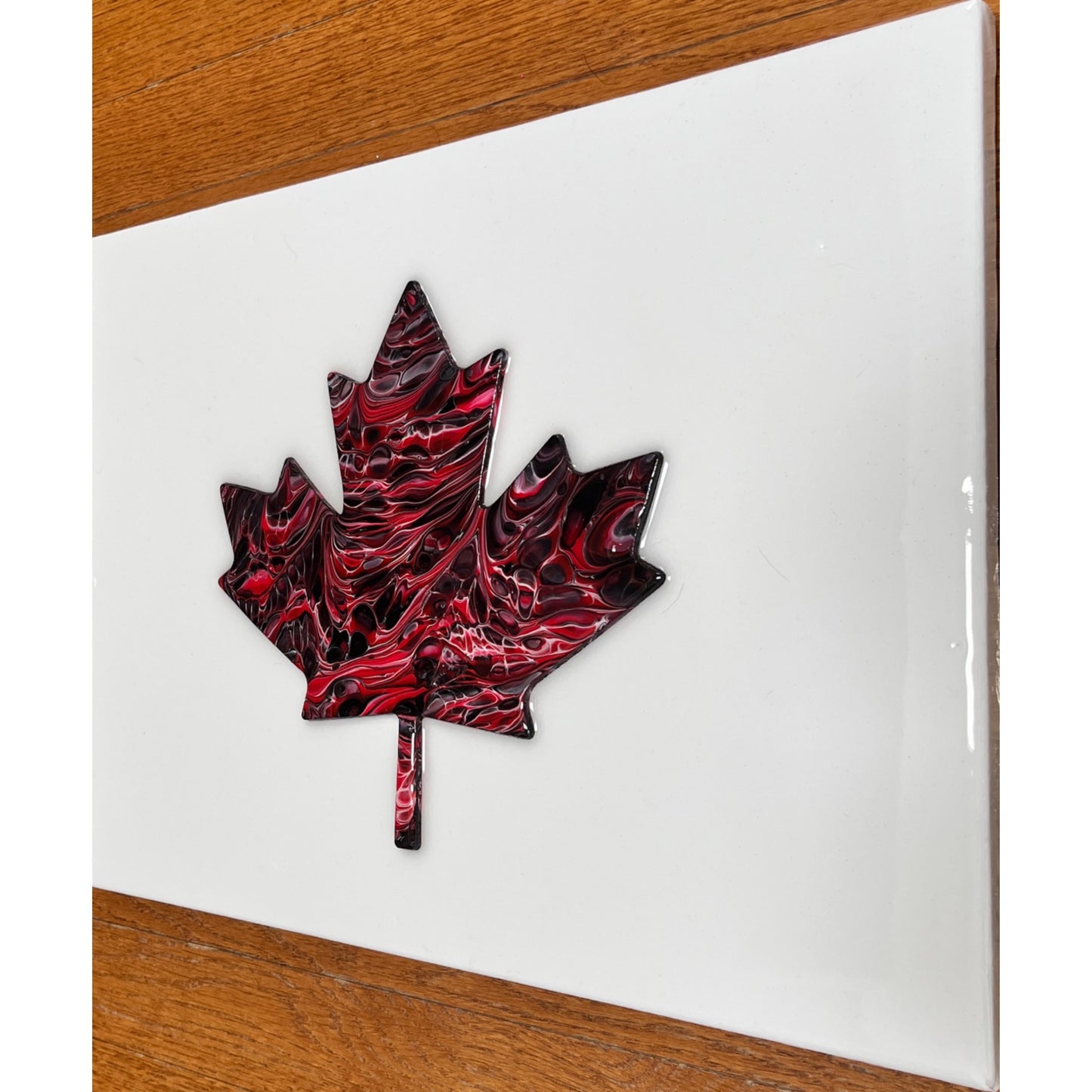 Black and white abstract cell art maple leaf on a white background. This image is of a stretched canvas print.