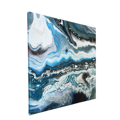 black, white, and blue fluid acrylics creating an icy abstract landscape